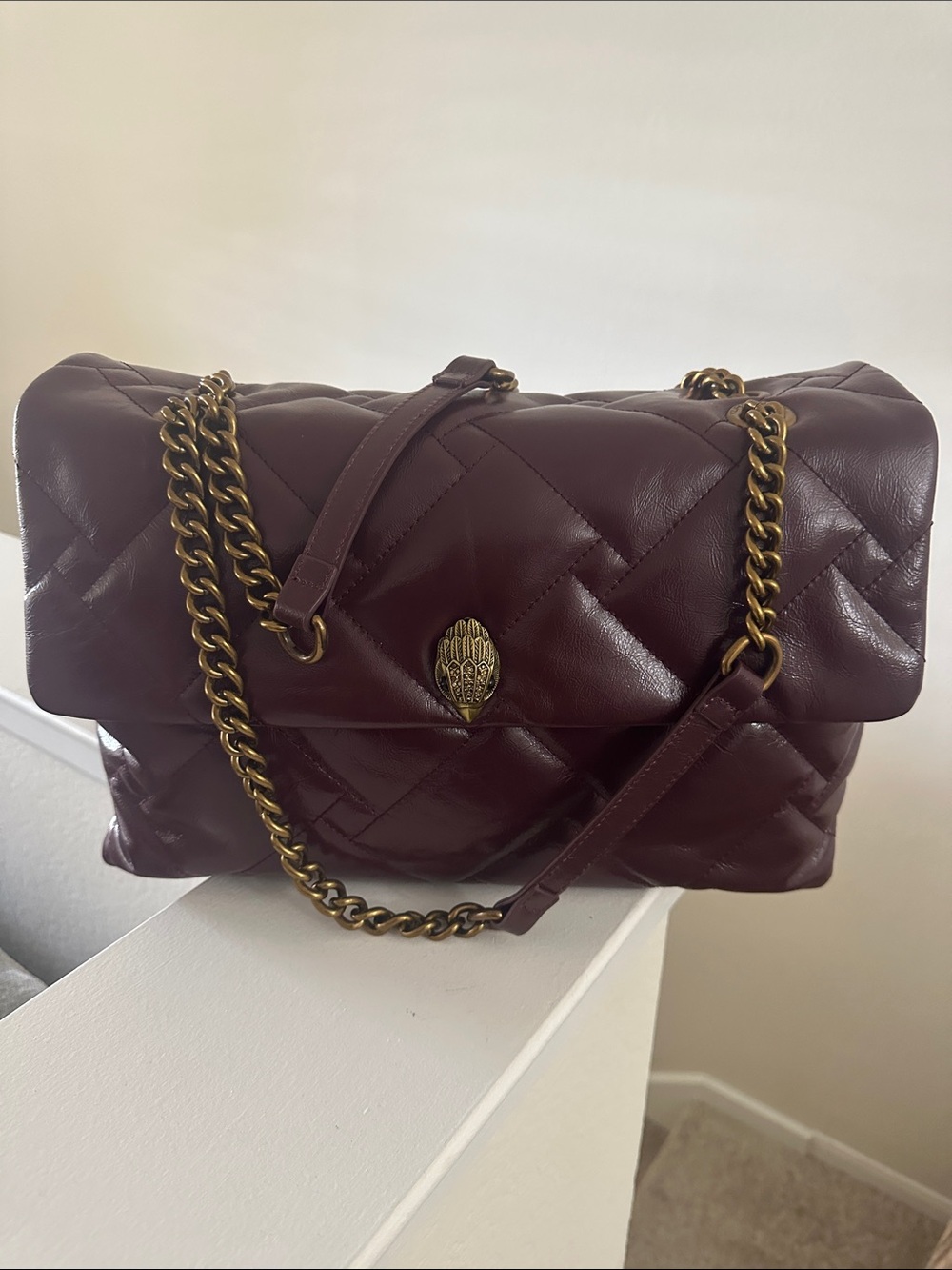 Kurt Geiger Quilted Burgundy Shoulder Bag with Gold Chain